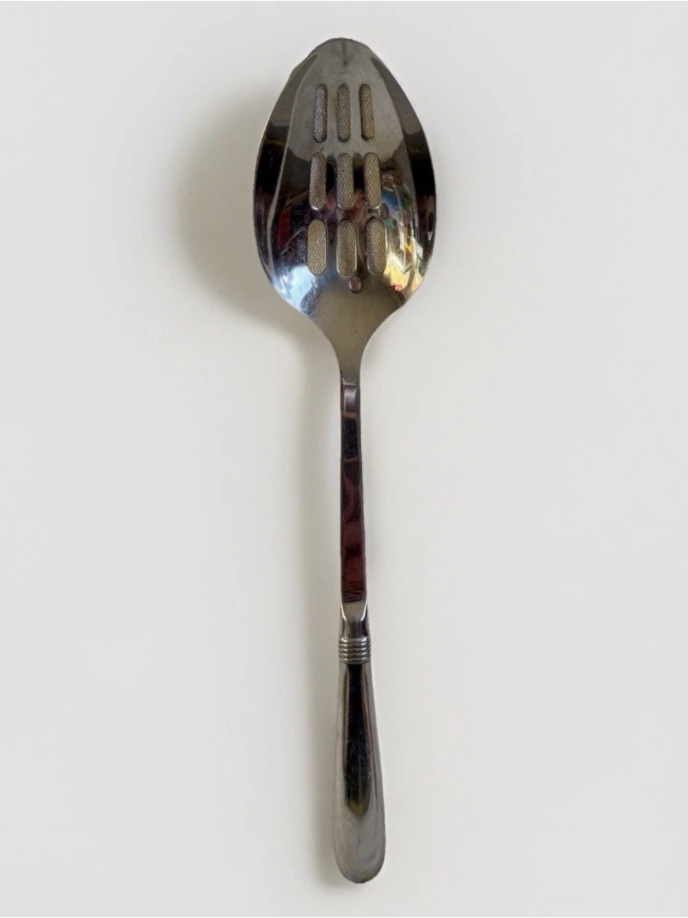 Oneida Mercutio Slotted Serving Spoon 18/8 Stainless Glossy Flared Tip
